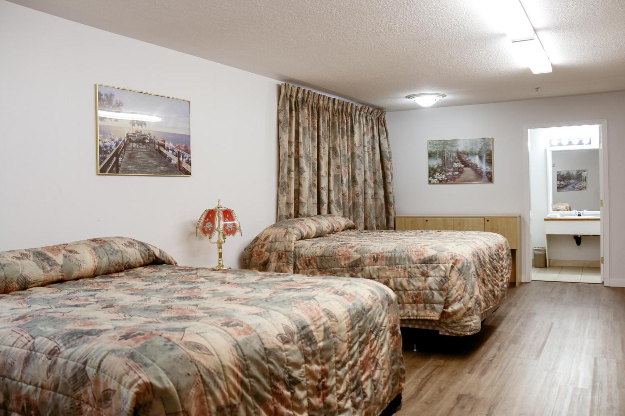 Western Budget Plus Mosaic Suites Penhold المظهر الخارجي الصورة